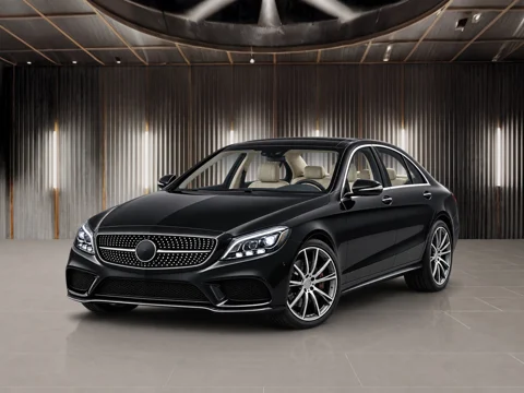 Black sedan in copper atelier setting