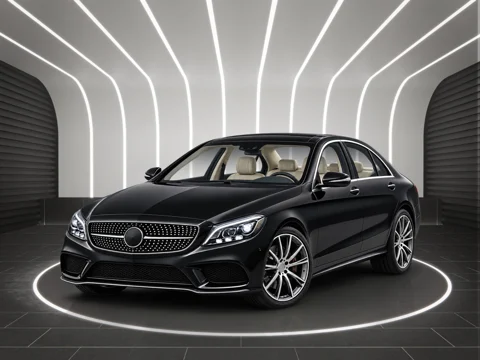 Black sedan in light tunnel setting