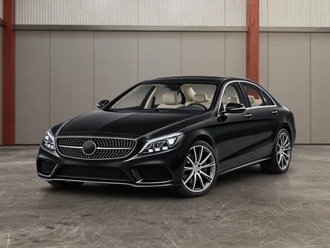 Black sedan in red beam workshop setting