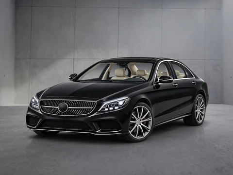 Black sedan in brushed grey setting