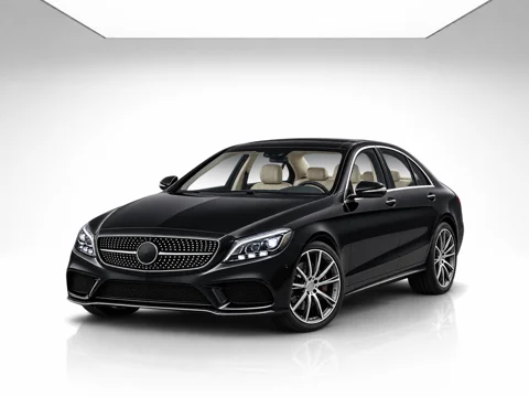 Black sedan in infinity white setting