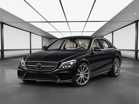 Black sedan in glass gallery setting