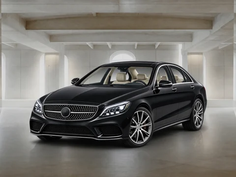 Black sedan in concrete hall setting