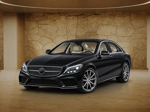 Black sedan in warm plaster setting