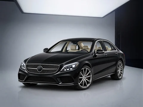 Black sedan in northlight studio setting