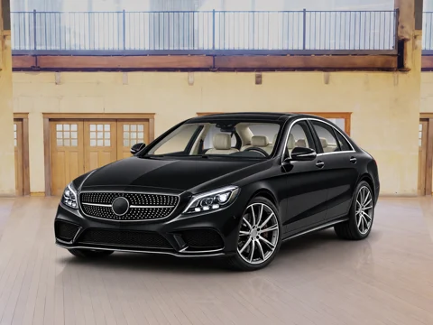 Black sedan in heritage workshop setting
