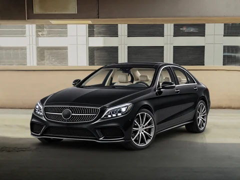 Black sedan in service bay setting